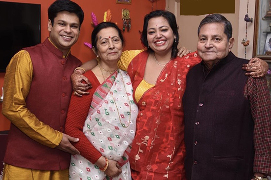 Aparupa (second from right) with (left from right) her husband, Saurabh; mother, Tanusree; and father, Dilip, during her 2019 engagement ceremony.