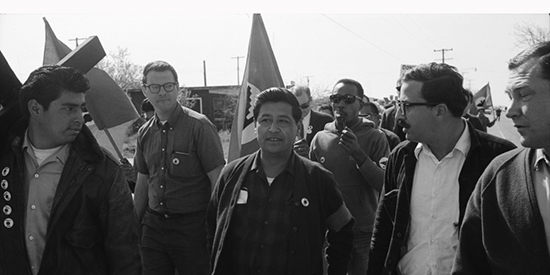César Chávez and protesters marching, 1966. Photo courtesy of the Ernest Lowe Photography Collection, UC Merced.