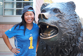 Lucy Tseng with Bruin sculpture