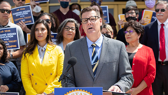 Jeff Girod (center) speaks at a 2022 press conference to rally support for a bill allocating more state funding for UC Riverside and the Inland Empire region. 