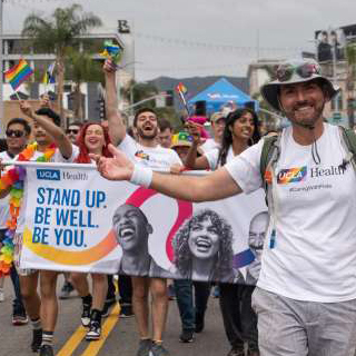 Daniel Kasprowicz leads UCLA Health staff walking in the 2023 Los Angeles Pride Parade. (Photo: Nick Carranza/UCLA Health)