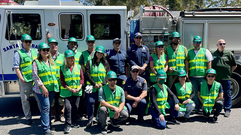 CERT members and firefighters in front of fire truck