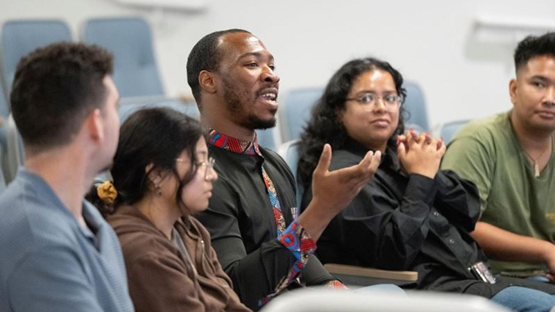 Students talking at UC Irvine School of Public Health