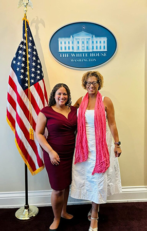 WorkLife Law Co-Director Jessica Lee and WLL Board Member Tina Sherman celebrate the 60th anniversary of Title VII at a White House event July 29