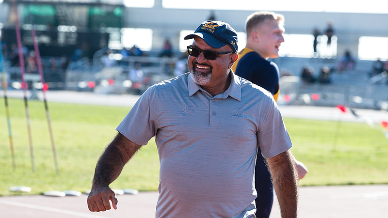 Mo Saatara walks across a field