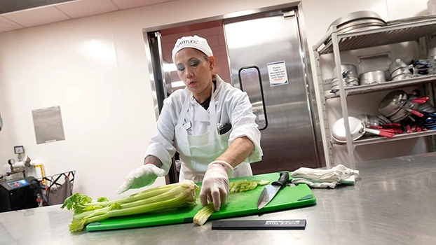 Andrea Rivera chops celery