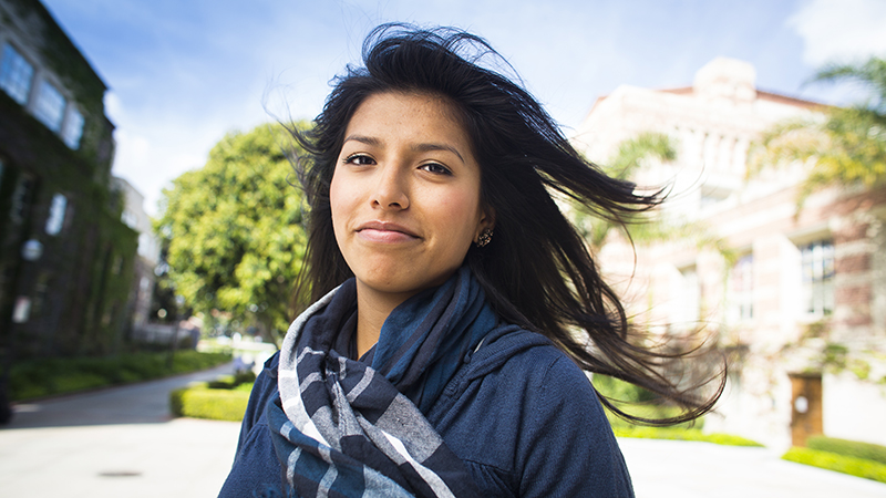 UC Riverside student with hair blowing in the breeze