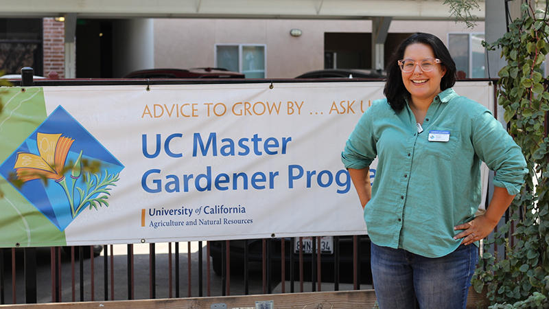 Kristian Salgado by the UC Cooperative Extension sign