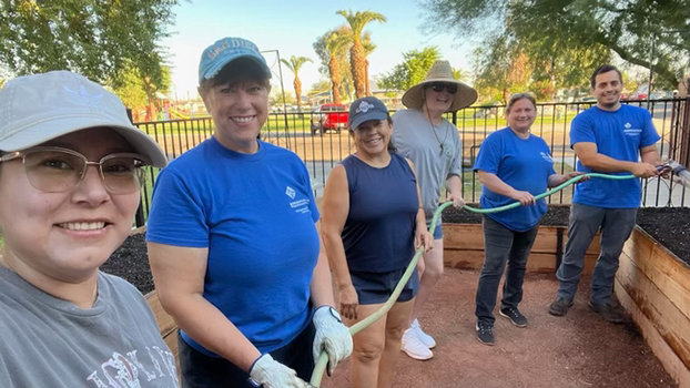 Women holding shovels