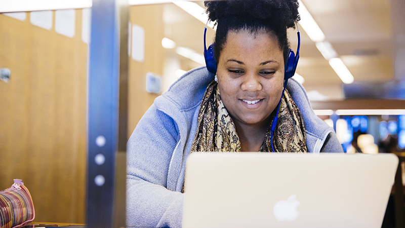 Woman working on laptop computer