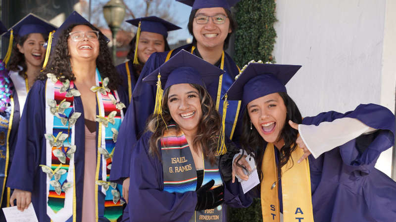 UC Merced students in graduation attire