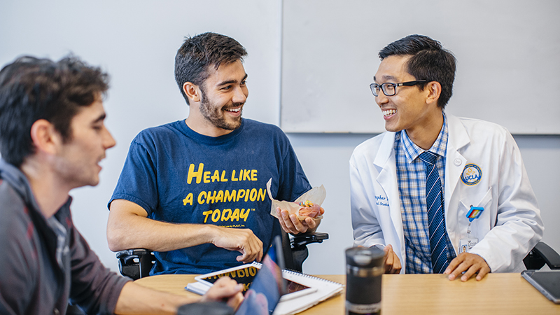 UCLA Health doctor talking with a patient