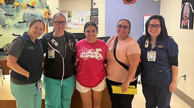 UC Health medical staff with Callie McCune and her mom