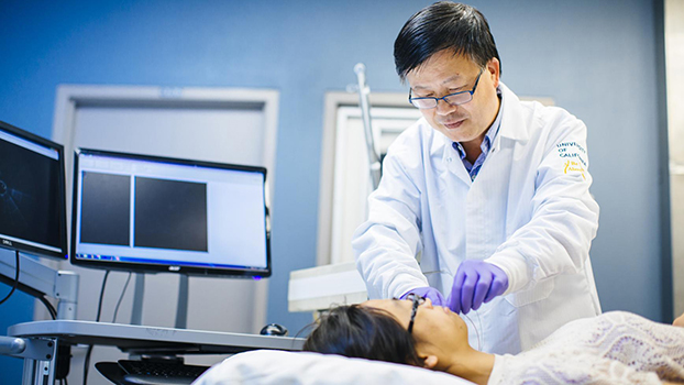 Surgeon talking to patient