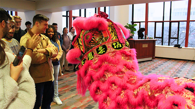 A standing-room-only crowd celebrates Lunar New Year with spectacular performance by San Francisco-based Lion Dance Me.