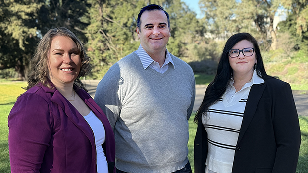 Syerra Logan (left), Mike Legrand (center), and Jen Carmichael (right) standing outside at UC Davis