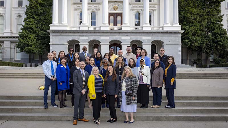 Council of UC Staff Assemblies (CUCSA) group photo on state capitol steps