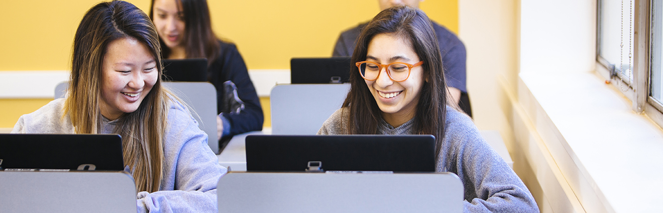 UC Berkeley students working on computers