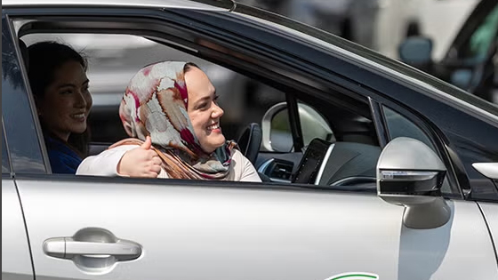 Nour Katabi, a project manager for non-profit CALSTART, gives a thumbs up.