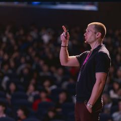 Russell speaking to a crowd
