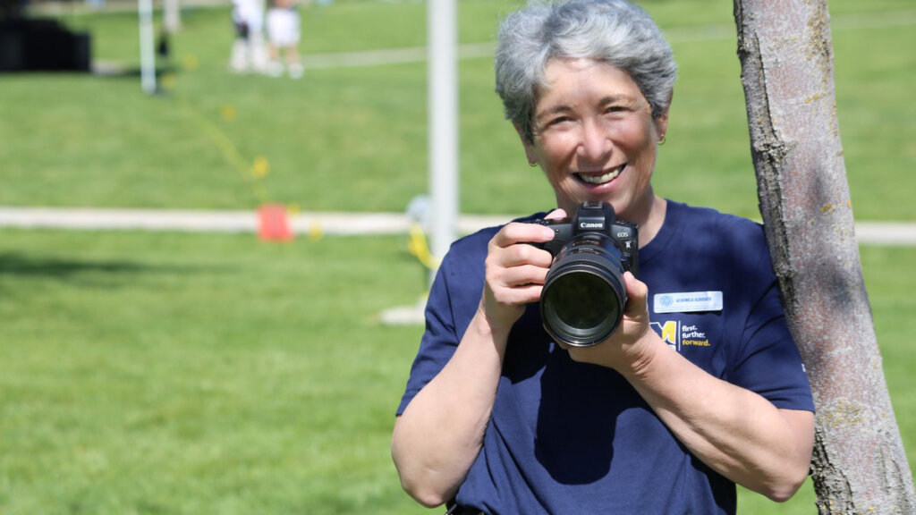 Veronica Adrover holding her camera