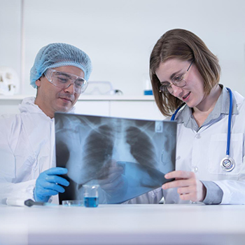 Doctors evaluating a lung scan