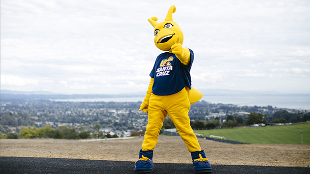 Slug mascot pointing