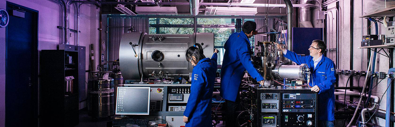 Researchers using scientific equipment
