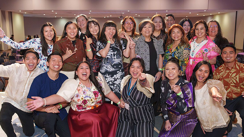 Members of UC San Diego's Asian and Pacific Islander American Heritage Month Planning Committee cheering