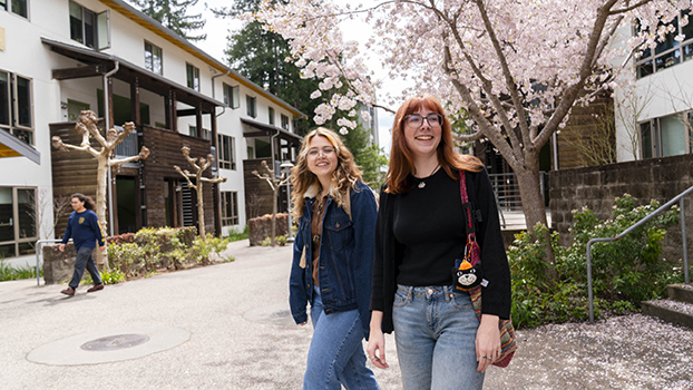 Students walk on the UCSC campus during spring.