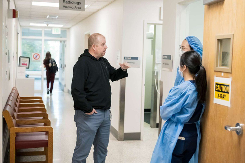 David talks with dental students
