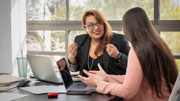 Women having a conversation at a table