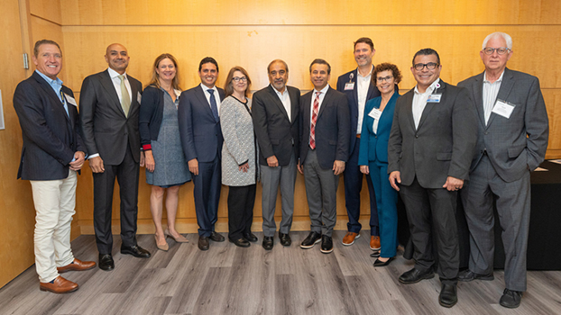 UC San Diego and FDA leaders standing in a row at UCSD
