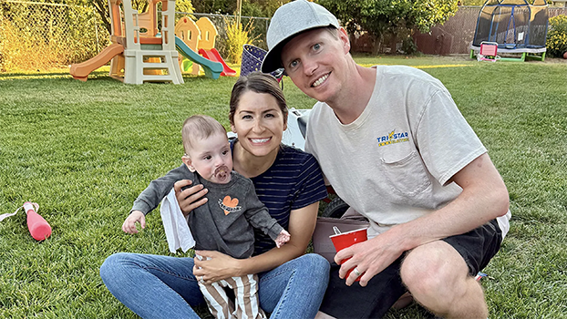 Lauren Kennington, her husband and their baby