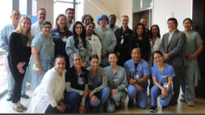 Group of smiling people in medical provider attire