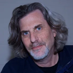 David Familian headshot wearing a black T-shirt