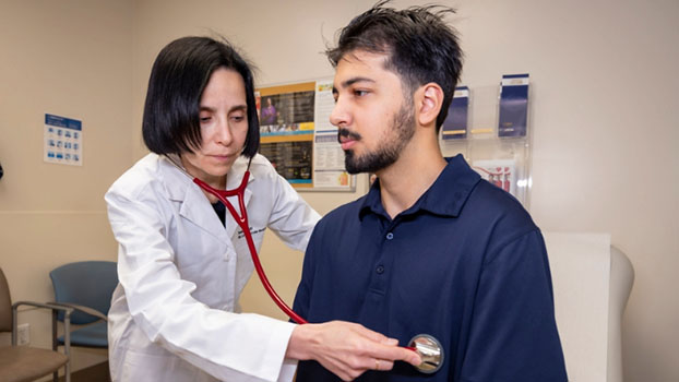 Doctor listening to a patient's heart