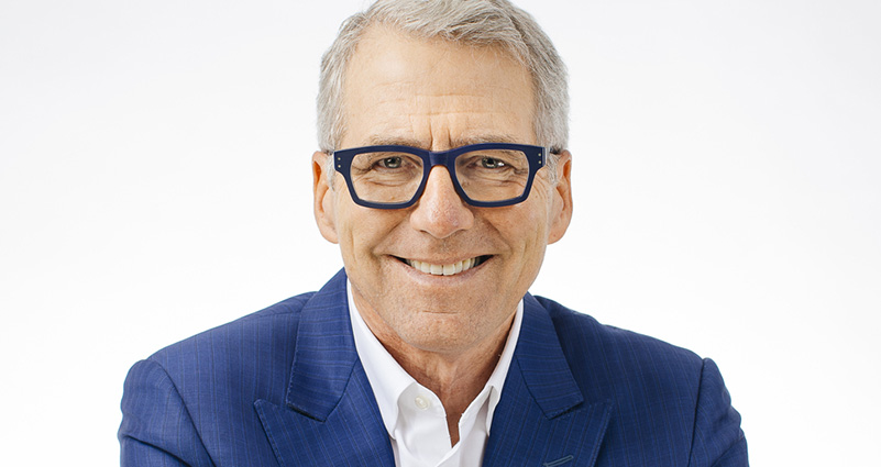 Pres. James B. Milliken in a blue suit