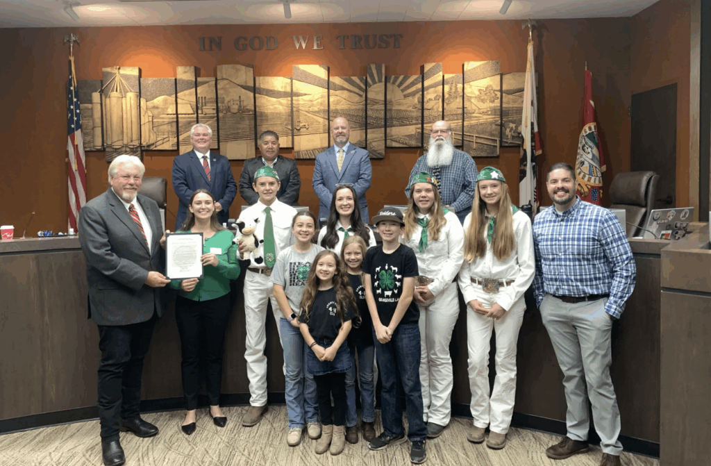 Group of diverse-aged people standing in a courtroom