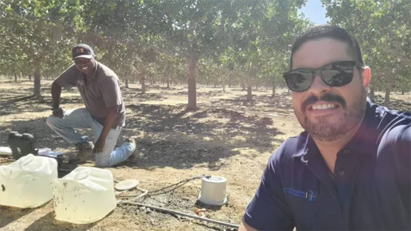 Leonel and Tobias in a field