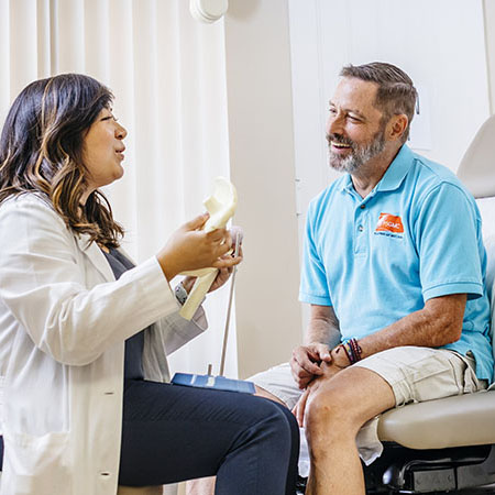 Doctor speaking with a patient at UC Riverside Health Palm Desert Family Medicine.