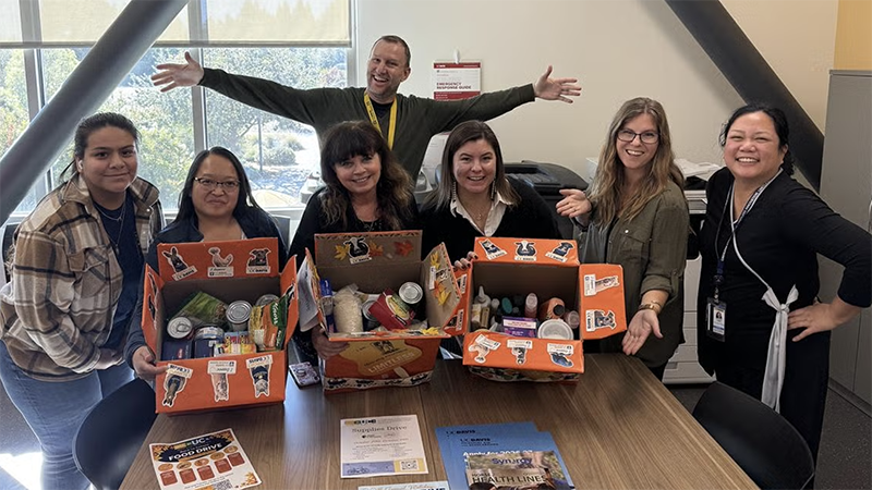 Group of people with boxes of supplies