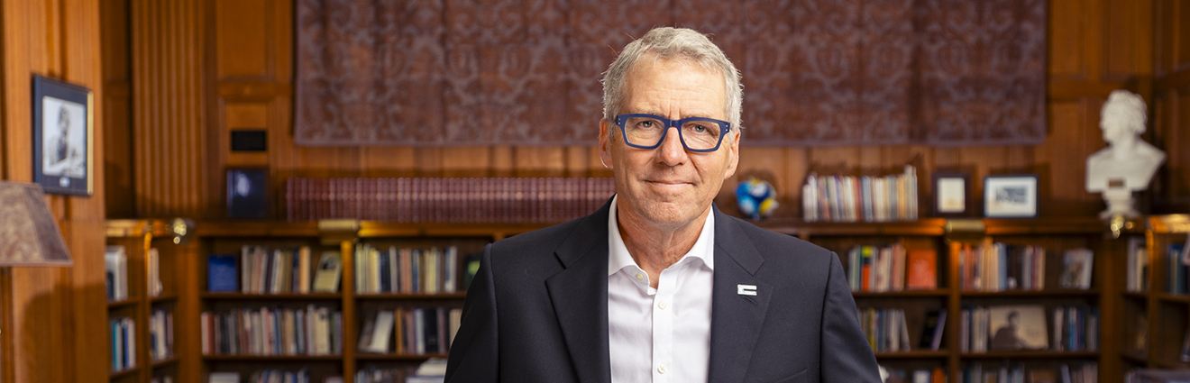 President Milliken in a library