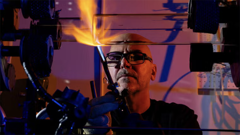 Stephen with his glassblowing torch