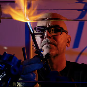 Stephen with his glassblowing torch