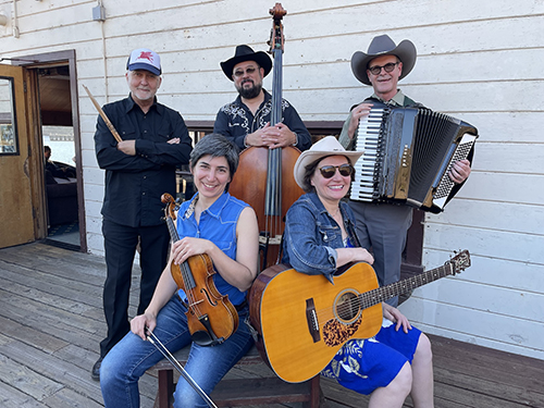 Five-person band casually dressed in California-Western style clothing