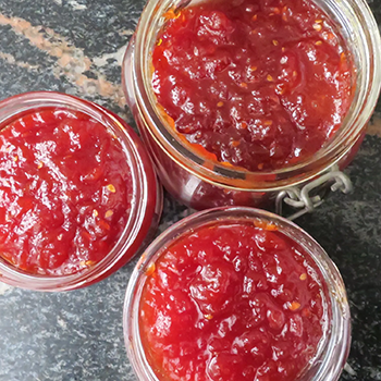 Mason jars filled with tomato jam