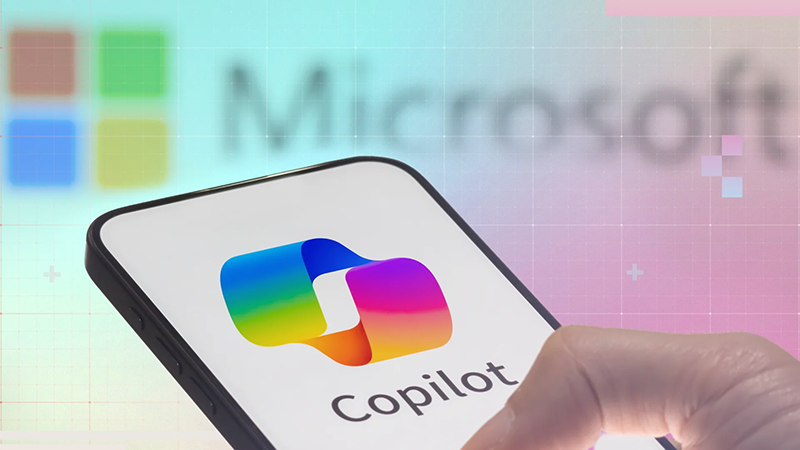 Person holding a phone with Copilot app visible