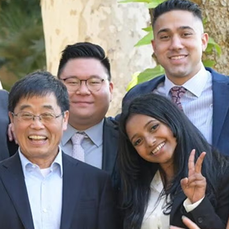 Group of smiling people standing together