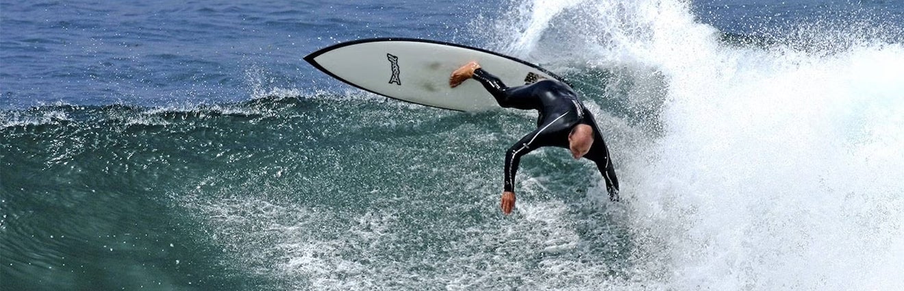 Tyler Callaway surfing